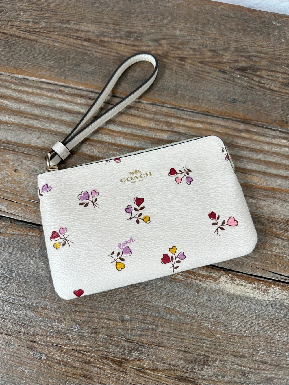 Coach Cream Wristlet with Multicolor Floral Hearts